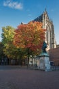 The back of the Dom Church with in front a statue of Jan van Nassau.